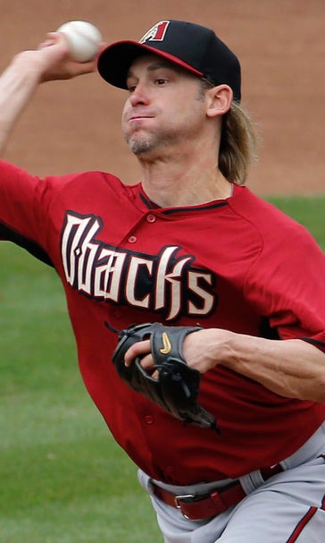 While settling into new surroundings, Arroyo takes on familiar role